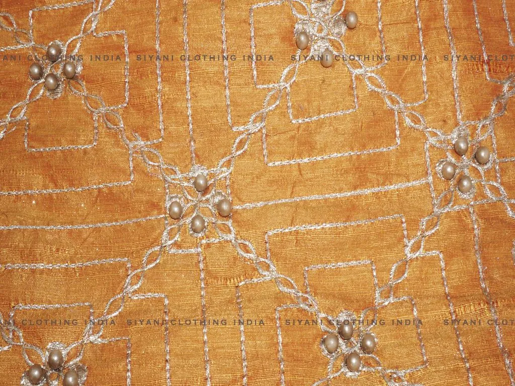 Orange Thread And Motifs Embroidered Silk Fabric